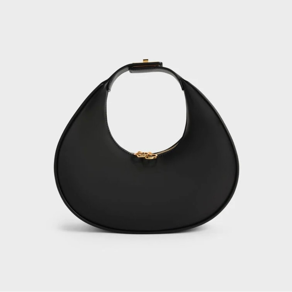 Brand new never used with tags Charles & Keith crescent bag